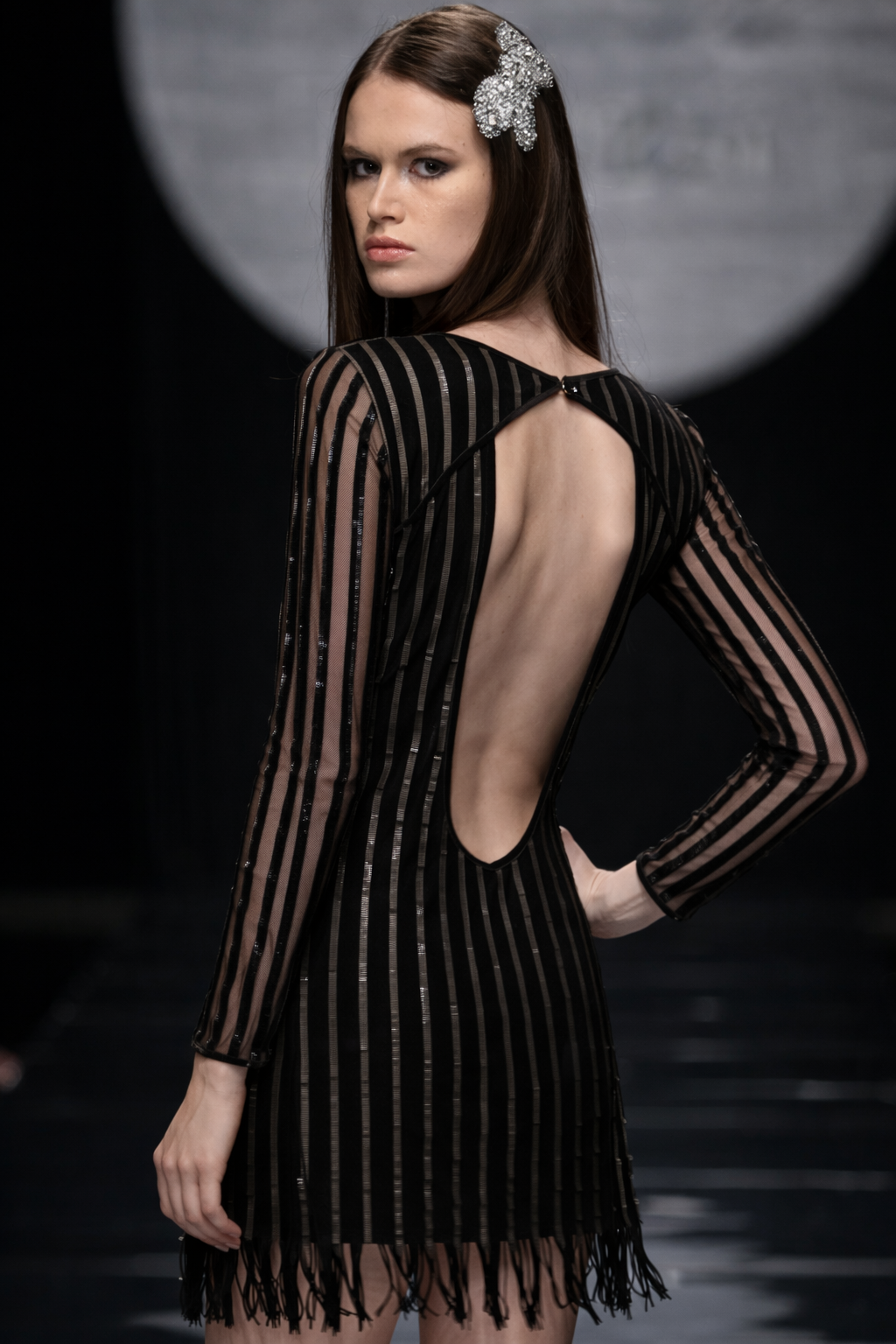 dress with leather straps This elevated look combines the edgy allure of a black leather strapless midi dress with the structured sophistication of an olive green blazer, making it perfect for an office party, holiday gathering,