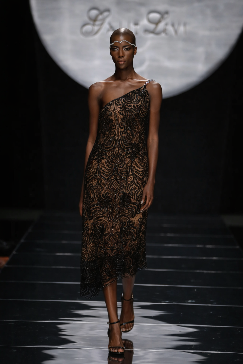 A SYMMETRIC GUIPURE LACE DRESS